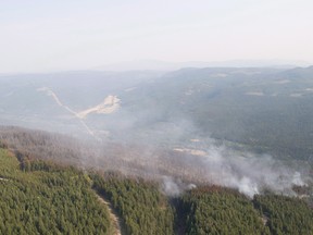 The Philpot Road wildfire is seen along a hillside just outside of Kelowna, B.C., on August 28, 2017.