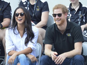 Prince Harry and Meghan Markle watch Wheel Chair tennis as part of the Invictus games in Toronto