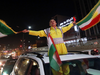 A Kurdish man waves the Kurdish flag to celebrate the independence referendum in Arbil, Iraq on Sept. 27, 2017