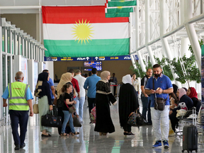 Passengers at Arbil airport, in the capital of Iraq's autonomous northern Kurdish region, on Sept. 28, 2017. All foreign flights to and from Arbil will be suspended from Friday, Iraqi officials said.