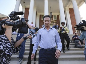 Louisville men's basketball coach Rick Pitino leaves Grawemeyer Hall after having a meeting with the university's interim president Greg Postel, Wednesday, Sept. 27, 2017, in Louisville. Ky. Louisville announced Wednesday that they have placed Pitino and athletic director Tom Jurich on administrative leave amid a federal bribery investigation. (Michael Clevenger/The Courier-Journal via AP)