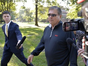 University of Louisville athletic director Tom Jurich arrives at the University's administration building for a meeting, Wednesday, Sept. 27, 2017, in Louisville, Ky. The university has scheduled a news conference Wednesday during which officials are expected to address the university's involvement in a federal bribery investigation, the latest scandal involving the Cardinals men's basketball program. (AP Photo/Timothy D. Easley)