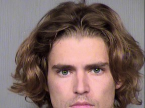 This undated photo provided by the Maricopa County Sheriff's Office shows Nicholas Van Varenberg, the 21-year-old son of actor Jean-Claude Van Damme. Van Varenberg is accused of holding his roommate at knifepoint at their apartment in suburban Phoenix. Tempe, Ariz., police say Van Varenberg was arrested Sunday night, Sept. 10, 2017, on suspicion of aggravated assault with a deadly weapon, unlawful imprisonment, marijuana possession and possession of drug paraphernalia. (Maricopa County Sheriff's Office via AP)