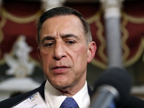 FILE - This May 17, 2017 file photo Rep. Darrell Issa, R-Calif., speaks with the media on Capitol Hill, in Washington. A California judge has ordered Issa to pay his opponent in last year's election more than $45,000 for legal expenses incurred during a defamation lawsuit. Issa, a San Diego County Republican, sued Democrat Doug Applegate in November over attack ads the congressman said hurt his reputation. The judge in March said Issa didn't prove his case, and also sided with Applegate, who argued that he was exercising free speech rights with the television commercials.  (AP Photo/Alex Brandon,File)