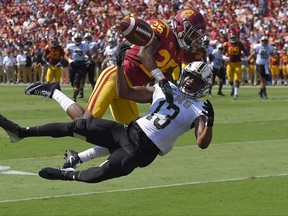 Western Michigan wide receiver Keishawn Watson, below, cannot get to a pass intended for him as Southern California cornerback Jack Jones defends during the first half of an NCAA college football game, Saturday, Sept. 2, 2017, in Los Angeles. Jones was called for pass interference on the play. (AP Photo/Mark J. Terrill)