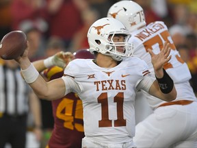 Texas quarterback Sam Ehlinger throws a pass during the first half of an NCAA college football game against Southern California, Saturday, Sept. 16, 2017, in Los Angeles. (AP Photo/Mark J. Terrill)