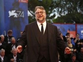 Director Guillermo del Toro poses for photographers during the red carpet for the closing ceremony at the 74th edition of the Venice Film Festival in Venice, Italy, Saturday, Sept. 9, 2017. (AP Photo/Domenico Stinellis)