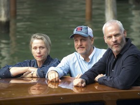 Actors Frances McDormand, from left, Woody Harrelson and director Martin McDonagh pose for photographers upon arrival at the press conference of the film 'Three Billboards Outside Ebbing, Missouri' during the 74th edition of the Venice Film Festival in Venice, Italy, Monday, Sep. 4, 2017. (Photo by Joel Ryan/Invision/AP)