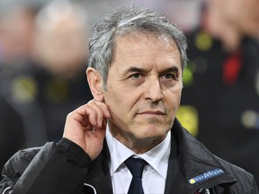 FILE - In this March 27, 2017 file photo Austria's head coach Marcel Koller arrives for an international friendly soccer match against Finland at the Tivoli Stadium in Innsbruck, Austria. An official of the Austrian football federation expects Koller not to be offered a new contract after the national soccer team has all but failed to qualify for the World Cup. (AP Photo/Kerstin Joensson, file)