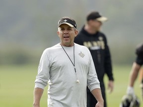 New Orleans Saints head coach Sean Payton walks off the field after an NFL training session at the London Irish rugby team training ground in the Sunbury-on-Thames suburb of south west London, Wednesday, Sept. 27, 2017. The New Orleans Saints are preparing for an NFL regular season game against the Miami Dolphins at London's Wembley stadium on Sunday. (AP Photo/Matt Dunham)