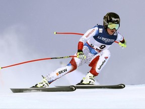FILE- In this Friday, Feb. 10, 2017 file photo, Switzerland's Lara Gut speeds down the course during a women's combined event, at the alpine ski World Championships, in St. Moritz, Switzerland. Olympic downhill bronze medalist Lara Gut has targeted World Cup races in North America to make her comeback from a serious knee injury at the world championships. (AP Photo/Alessandro Trovati, File)