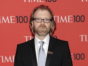 FILE - In this April 23, 2013 file photo, writer George Saunders attends the TIME 100 Gala celebrating the "100 Most Influential People in the World" in New York. American author George Saunders is favored to win the prestigious Man Booker Prize for fiction with his novel of the afterlife, "Lincoln in the Bardo." Bookmakers Ladbrokes and William Hill made Saunders the front-runner among six titles vying for the 50,000 pound ($66,000) prize. The winner will be announced Oct. 17, 2017. (Photo by Evan Agostini/Invision/AP, File)