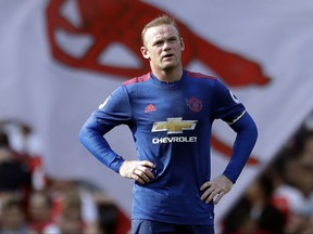 FILE - In this Sunday, May 7, 2017 file photo, Wayne Rooney looks on during the English Premier League soccer match between Arsenal and Manchester United at the Emirates stadium in London. Cheshire police say Wayne Rooney has been charged with drunk driving. The 31-year-old Everton striker was reportedly stopped by police near him home outside Manchester early Friday, Sept. 1, 2017. (AP Photo/Matt Dunham, file)