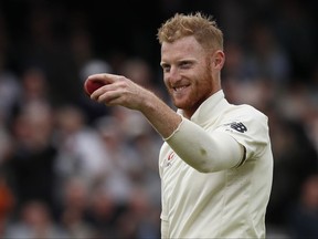 FILE - In this Thursday, Sept. 7, 2017 file photo, England's Ben Stokes holds up the ball after taking his sixth wicket on the first day of the third test match between England and the West Indies at Lord's cricket ground in London. The England and Wales Cricket Board says all-rounder Ben Stokes was arrested after incident in Bristol. In a statement, the ECB added that Stokes was detained early Monday, Sept. 25 but was released without charge in the evening. (AP Photo/Kirsty Wigglesworth, file)