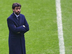 FILE- In this file photo dated Tuesday, March 15, 2016, Andrea Agnelli, president of Juventus, arrives at the Allianz Arena stadium prior to the Champions League soccer match between Bayern Munich and Juventus Turin in Munich, Germany. Juventus president Andrea Agnelli has been banned for a year by the Italian football federation for an allegedly illicit relationship with hard-core "ultra" fans that encouraged ticket scalping. The court also fined Juventus 300,000 euros ($350,000) on Monday, Sept. 25, 2017. (AP Photo/Matthias Schrader, FILE)