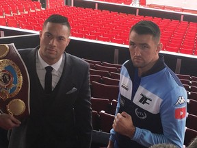 Joseph Parker, left, and Hughie Fury meet at Old Trafford soccer stadium in Manchester, England, on Thursday Sept. 21, 2017, ahead of their fight for the WBO heavyweight title.  heavyweight champion Joseph Parker arrived in a tailored suit for a final media conference ahead of the second defense of his WBO belt against Highie Fury on upcoming Saturday. (Steve Douglas/AP Photo)