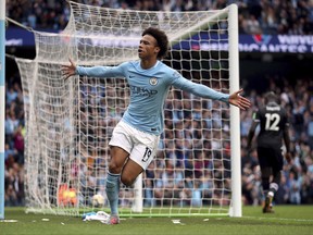 Manchester City's Leroy Sane celebrates scoring his side's first goal of the game, during the English Premier League soccer match between Manchester City and Crystal Palace, at the Etihad Stadium, in Manchester, England,  Saturday, Sept. 23, 2017. (Nick Potts/PA  via AP)