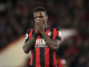 Bournemouth's Jermain Defoe reacts after a missed chance during the English Premier League soccer match between Bournemouth and Brighton, at the Vitality Stadium, in Bournemouth, England, Friday, Sept. 15, 2017. (John Walton/PA via AP)
