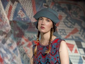 A model displays a creation during the Sadie Williams Spring/Summer 2018 show for London Fashion Week held at BFC Show Space in London, Saturday Sept. 16, 2017. (Isabel Infantes/PA via AP)