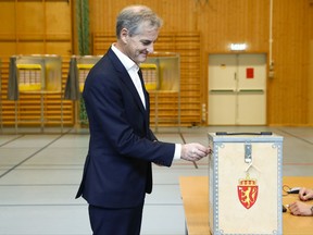 Norway's Labour Party leader Jonas Gahr Store casts his vote to the Norwegian parliamentary election in Oslo, Norway, Sunday, Sept. 10, 2017.  (Terje Pedersen / NTB scanpix via AP)