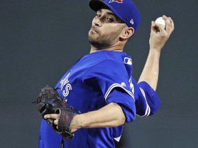 Toronto Blue Jays starting pitcher Marco Estrada delivers during the first inning of a baseball game against the Boston Red Sox at Fenway Park in Boston, Wednesday, Sept. 27, 2017. (AP Photo/Charles Krupa)