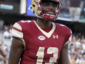 Boston College quarterback Anthony Brown (13) reacts as he leaves the field after throwing a interception during the second half of an NCAA college football game against Wake Forest, Saturday, Sept. 9, 2017, in Boston. (AP Photo/Mary Schwalm)