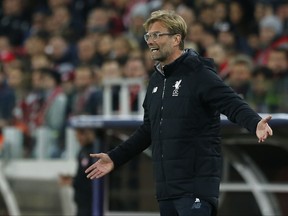 Liverpool coach Juergen Klopp gestures during the Champions League soccer match between Spartak Moscow and Liverpool in Moscow, Russia, Tuesday, Sept. 26, 2017. (AP Photo/Alexander Zemlianichenko)