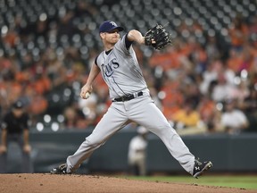 Tampa Bay Rays pitcher Alex Cobb throws against the Baltimore Orioles in the first inning of a baseball game, Friday, Sept. 22, 2017, in Baltimore. (AP Photo/Gail Burton)