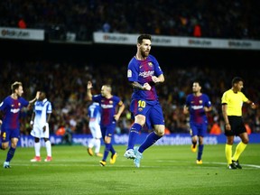 FC Barcelona's Lionel Messi celebrates after scoring during the Spanish La Liga soccer match between FC Barcelona and Espanyol at the Camp Nou stadium in Barcelona, Spain, Saturday, Sept. 9, 2017. (AP Photo/Manu Fernandez)