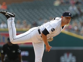 Detroit Tigers pitcher Artie Lewicki throws against the Kansas City Royals in the first inning of a baseball game in Detroit, Monday, Sept. 4, 2017. (AP Photo/Paul Sancya)