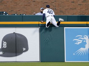 Detroit Tigers center fielder JaCoby Jones (40) watches a Kansas City Royals' Salvador Perez solo home run over the fence in the second inning of a baseball game in Detroit, Wednesday, Sept. 6, 2017. (AP Photo/Paul Sancya)