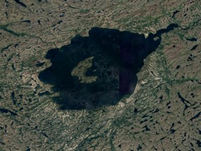 A satellite image of the Mistastin impact crater, once the site of the hottest temperature ever verified by science as having occurred on the earth's surface.