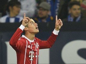 Bayern's James Rodriguez celebrates after scoring during the German Bundesliga soccer match between FC Schalke 04 and Bayern Munich at the Arena in Gelsenkirchen, Germany, Tuesday, Sept. 19, 2017. (AP Photo/Martin Meissner)