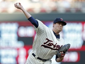 Minnesota Twins pitcher Kyle Gibson throws against the Kansas City Royals in the first inning of a baseball game Saturday, Sept, 2, 2017, in Minneapolis. (AP Photo/Jim Mone)