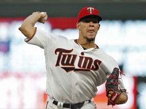Minnesota Twins pitcher Jose Berrios throws against the Toronto Blue Jays in the first inning of a baseball game Thursday, Sept. 14, 2017, in Minneapolis. (AP Photo/Jim Mone)