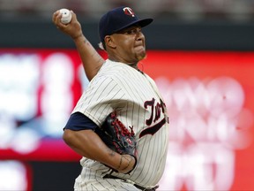 Minnesota Twins pitcher Adalberto Mejia throws against the Toronto Blue Jays in the first inning of a baseball game Saturday, Sept. 16, 2017, in Minneapolis. (AP Photo/Jim Mone)