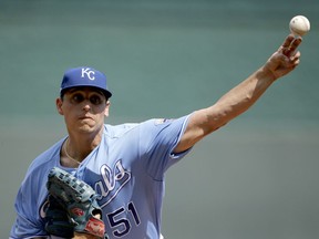 Kansas City Royals starting pitcher Jason Vargas throws during the first inning of a baseball game against the Minnesota Twins, Sunday, Sept. 10, 2017, in Kansas City, Mo. (AP Photo/Charlie Riedel)