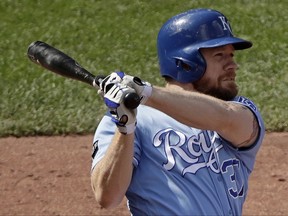 Kansas City Royals' Brandon Moss watches his three-run home run during the seventh inning of a baseball game against the Minnesota Twins, Sunday, Sept. 10, 2017, in Kansas City, Mo. (AP Photo/Charlie Riedel)