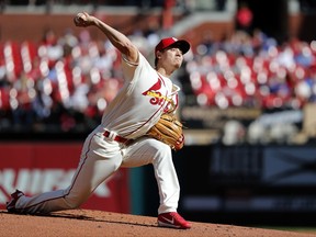 St. Louis Cardinals starting pitcher Luke Weaver throws during the first inning of a baseball game against the Milwaukee Brewers, Saturday, Sept. 30, 2017, in St. Louis. (AP Photo/Jeff Roberson)