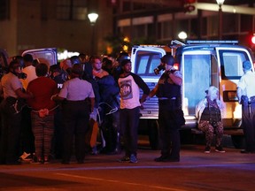 Police make multiple arrests after a peaceful protest turned violent response to a not guilty verdict in the trial of former St. Louis police officer Jason Stockley Sunday, Sept. 17, 2017, in St. Louis. Stockley was acquitted on Friday in the 2011 killing of a black man following a high-speed chase. (AP Photo/Jeff Roberson)