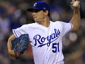 Kansas City Royals starting pitcher Jason Vargas delivers to a Detroit Tigers batter during the first inning of a baseball game at Kauffman Stadium in Kansas City, Mo., Tuesday, Sept. 26, 2017. (AP Photo/Orlin Wagner)