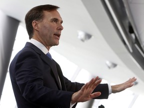 Finance Minister Bill Morneau takes part in a discussion at the fourth annual Canada 2020 Conference in Ottawa Thursday June 15, 2017. As the country's finance ministers meet in Ottawa, the Trudeau government should expect to hear concerns about the added burden marijuana legalization could heap onto provincial shoulders.THE CANADIAN PRESS/Fred Chartrand ORG XMIT: FXC500