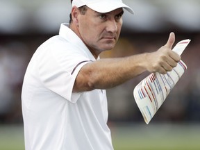 Mississippi State head coach Dan Mullen gestures toward the officials after a favorable call during the first half of an NCAA college football game against LSU in Starkville, Miss., Saturday, Sept. 16, 2017. (AP Photo/Rogelio V. Solis)