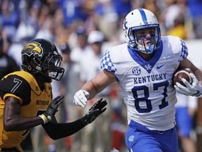 Kentucky tight end C.J. Conrad (87) rushes past Southern Mississippi defensive back Jomez Applewhite (7) for a 59-yard first half pass reception during an NCAA college football game in Hattiesburg, Miss., Saturday, Sept. 2, 2017. (AP Photo/Rogelio V. Solis)