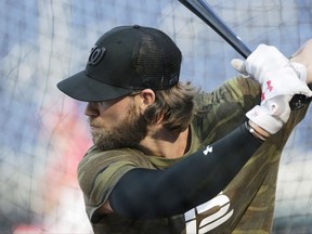Washington Nationals' Bryce Harper takes batting practice prior to a baseball game against the Los Angeles Dodgers, Sunday, Sept. 17, 2017, in Washington. (AP Photo/Mark Tenally)