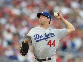 Los Angeles Dodgers starting pitcher Rich Hill delivers a pitch during the second inning of a baseball game against the Washington Nationals, Saturday, Sept. 16, 2017, in Washington. (AP Photo/Nick Wass)