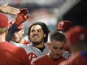Philadelphia Phillies' Jorge Alfaro celebrates his home run in the dugout during the third inning of a baseball game against the Washington Nationals, Thursday, Sept. 7, 2017, in Washington. (AP Photo/Nick Wass)
