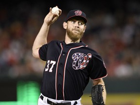 Washington Nationals starting pitcher Stephen Strasburg delivers a pitch during the third inning of a baseball game against the Pittsburgh Pirates, Friday, Sept. 29, 2017, in Washington. (AP Photo/Nick Wass)