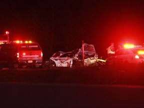 Rescue vehicles and workers are shown on the scene of a fatal accident near Memramcook, N.B., Tuesday, Sept.12, 2017.