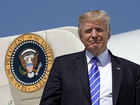 President Donald Trump during his arrival at Bismarck Municipal Airport, Wednesday, Sept. 6, 2017 in Bismarck, N.D. Trump is in North Dakota to promote his tax overhaul plan. (AP Photo/Pablo Martinez Monsivais)